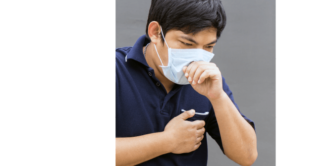 胸を押さえ苦しそうなマスクをした男性